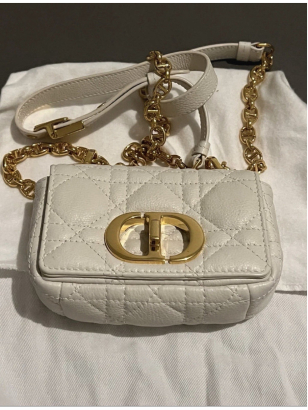 white Dior Caro bag crafted from quilted calfskin leather with a gold-tone"CD"
